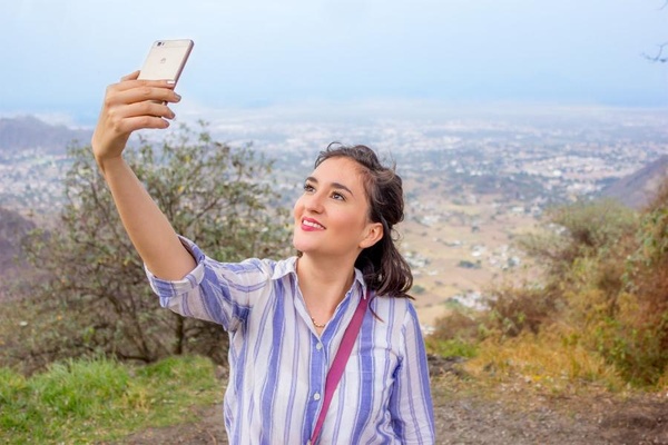 Hoe maak je de mooiste selfie voor in je fotoboek?